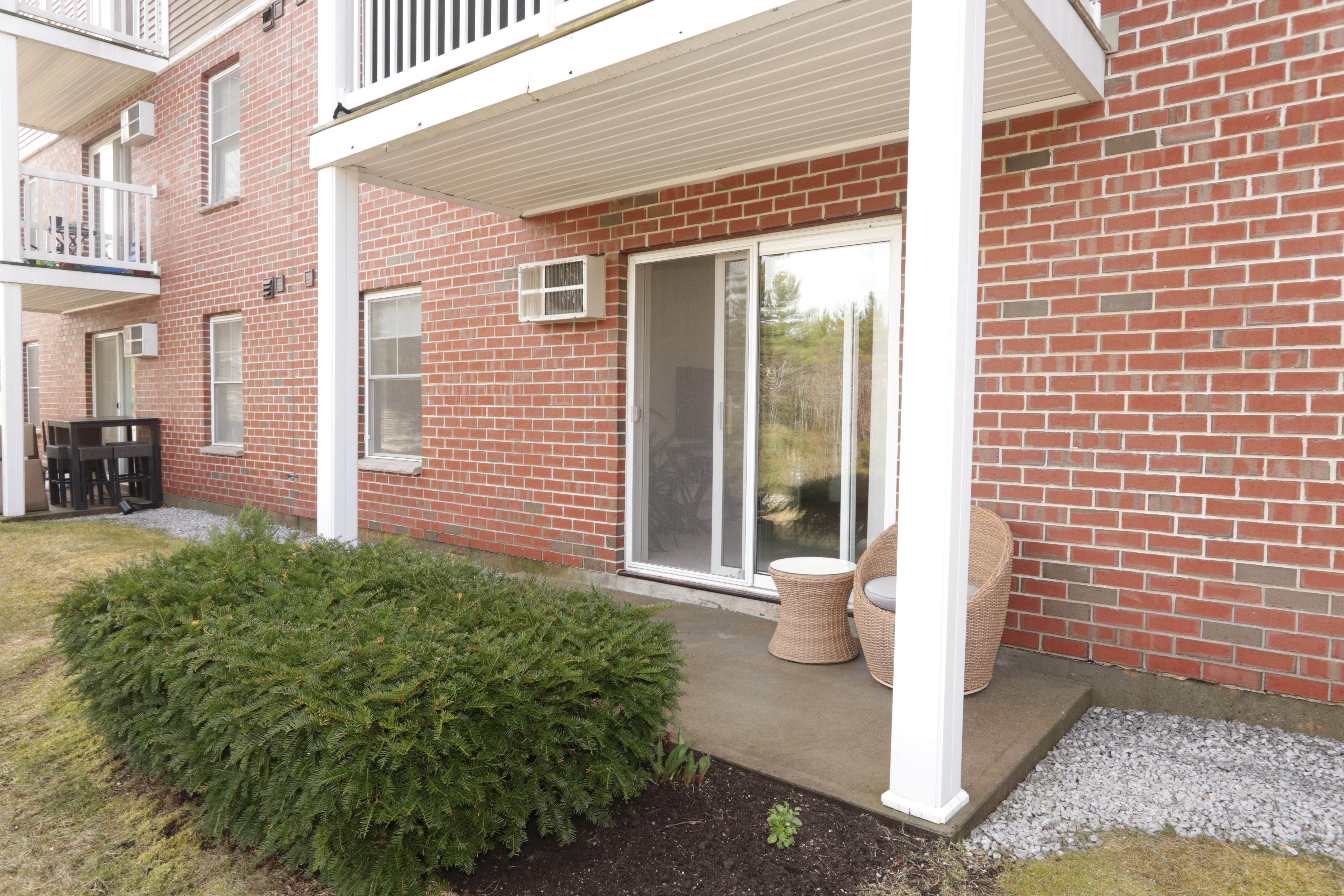 Milford condo for sale at Quarrywood Green 59 Ponemah Hill Rd Apt 2-LL2 Milford NH 03055patio 2