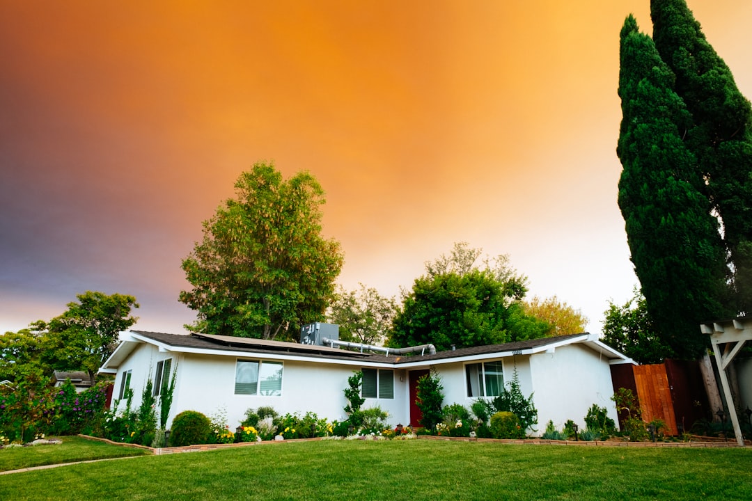 Photo by Gus Ruballo landscape photography of bungalow house