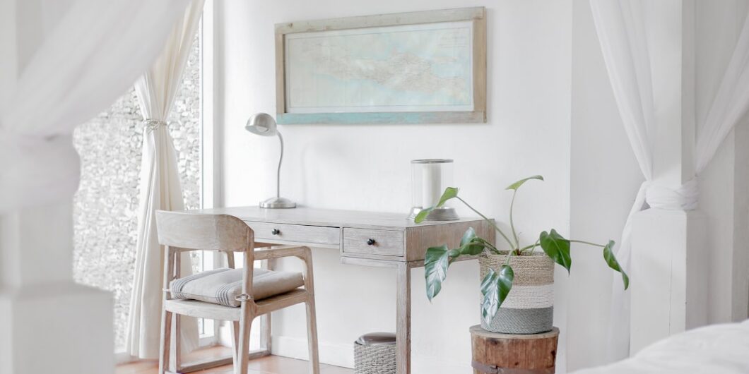 empty desk near curtain