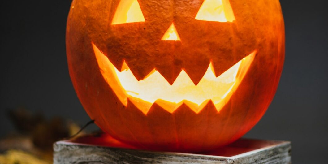 jack o lantern on brown wooden table
