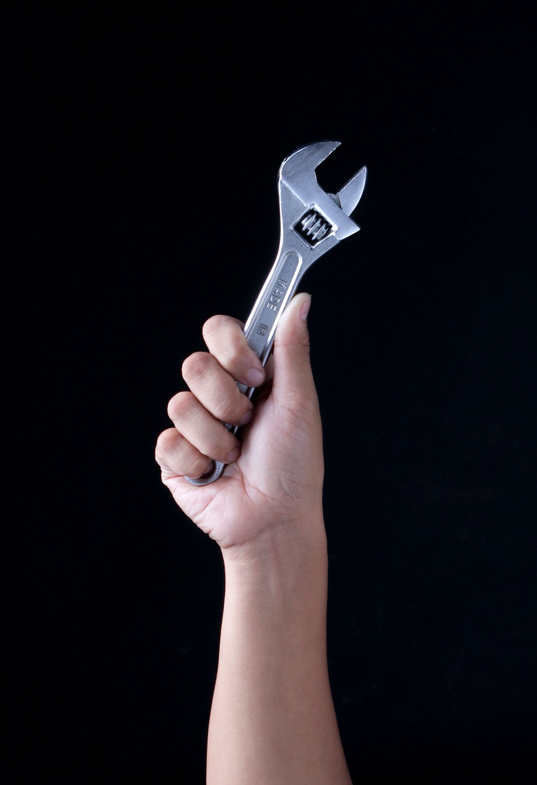 Photo by Recha Oktaviani person holding gray and black metal tool