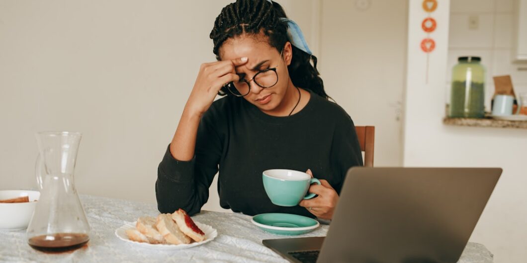 woman in black long sleeve shirt sitting on chair