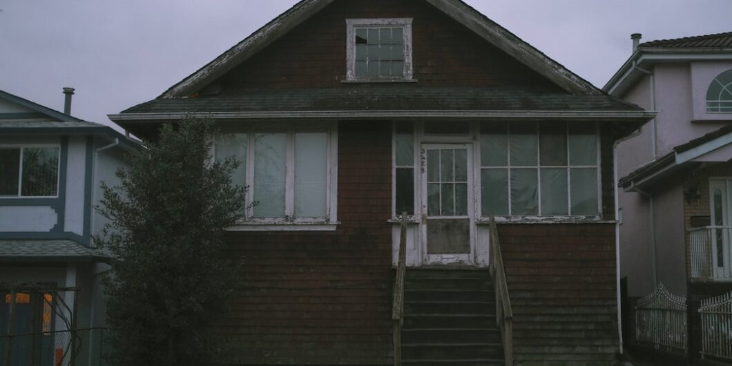 a house with a staircase going up to it