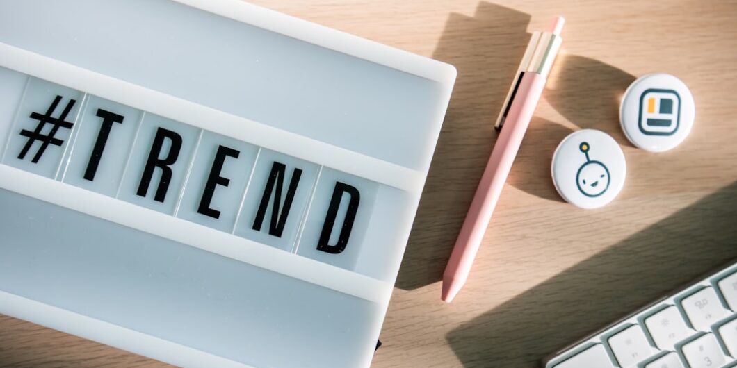 a keyboard with the word trend spelled on it