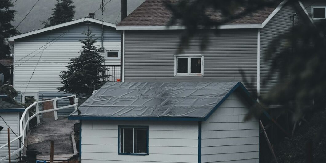 a view of a house from the top of a hill
