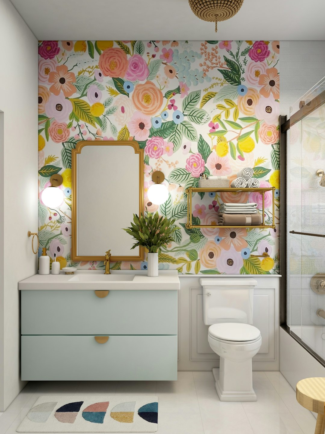 Photo by Grace Kelly a bathroom with a floral wallpaper and a white toilet