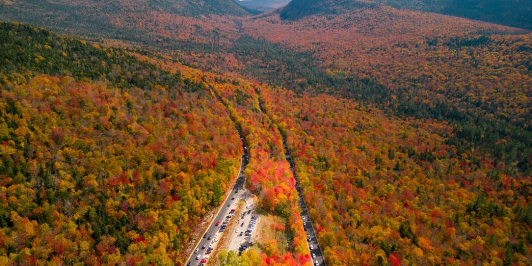 a winding road through a beautiful landscape